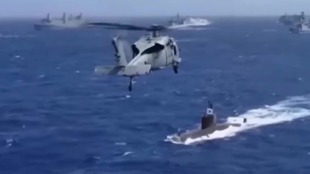 ⁣Military Helicopter Flying Over Submarine B-Roll