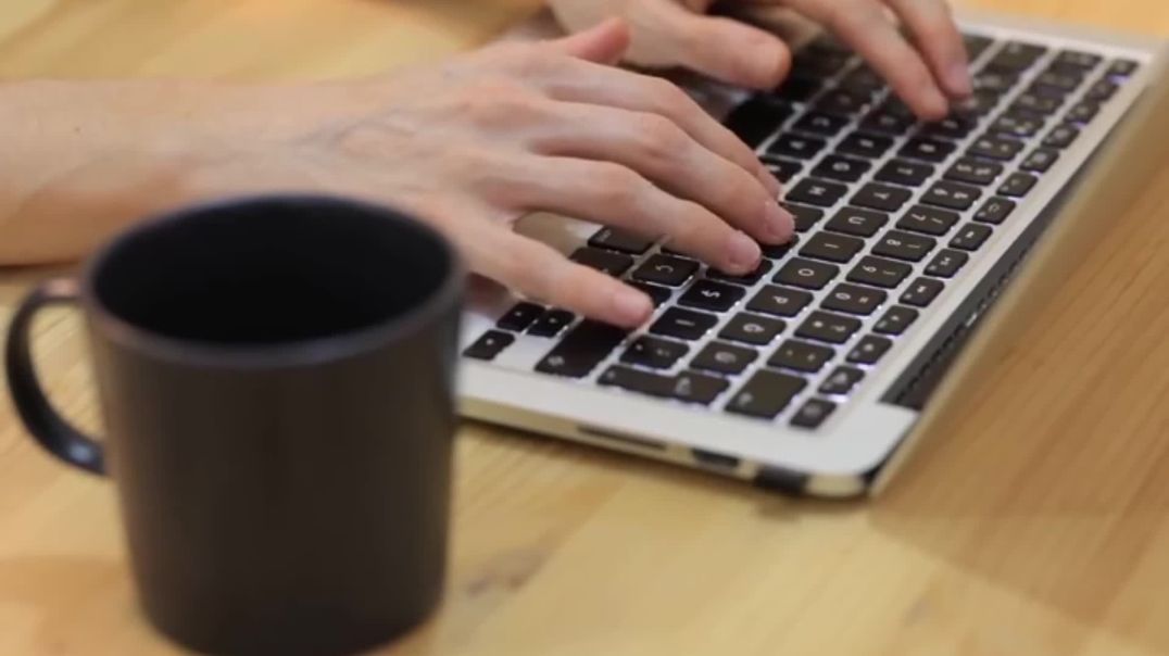 ⁣Fast Typing on Laptop with Coffee Free Stock Footage
