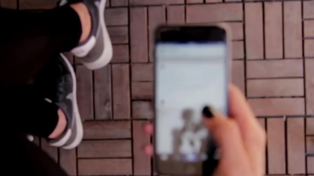 Out of Focus Woman Using Smartphone Free Stock Footage