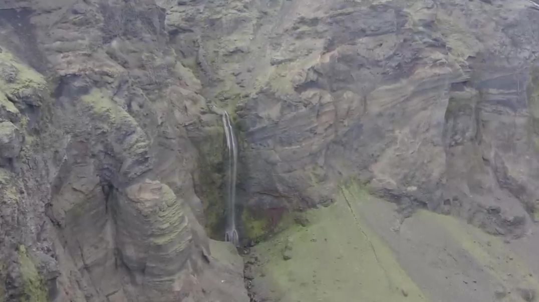 ⁣Cinematic Waterfall in Icelandic Cliffs Free B-Roll