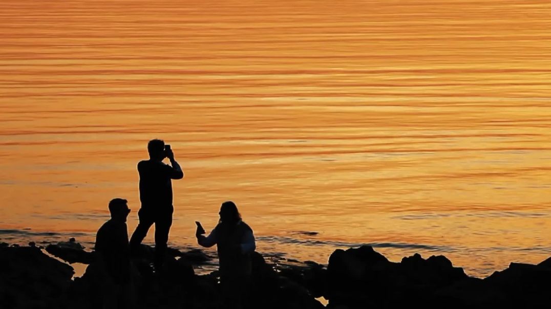 ⁣Cinematic Sunset Coast Group Silhouette Free Download